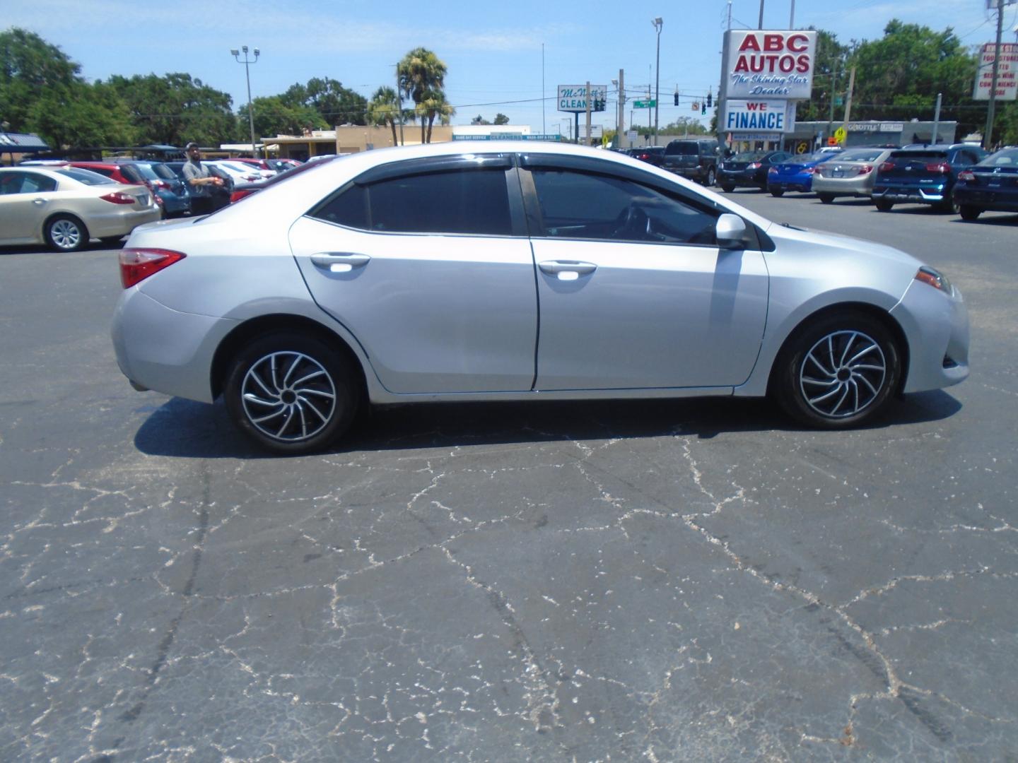 2017 SILVER Toyota Corolla L CVT (2T1BURHE1HC) with an 1.8L L4 DOHC 16V engine, CVT transmission, located at 6112 N Florida Avenue, Tampa, FL, 33604, (888) 521-5131, 27.954929, -82.459534 - Photo#4